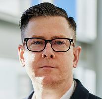 Alexander Hughes, dyrektor generalny firmy kryptowalutowej, portret
